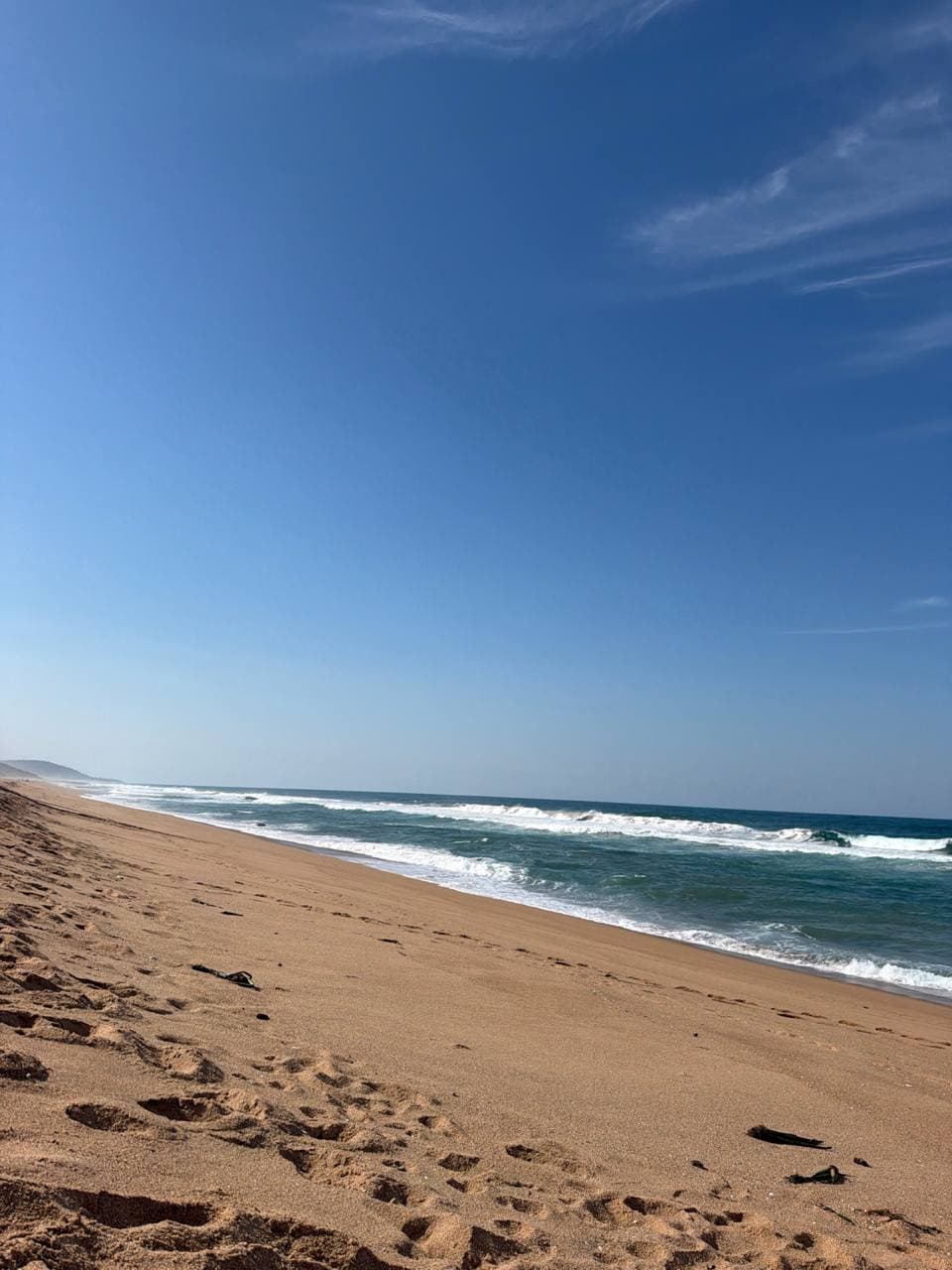 Matt working from the beach while using an AI agent to develop the Tandem idea.